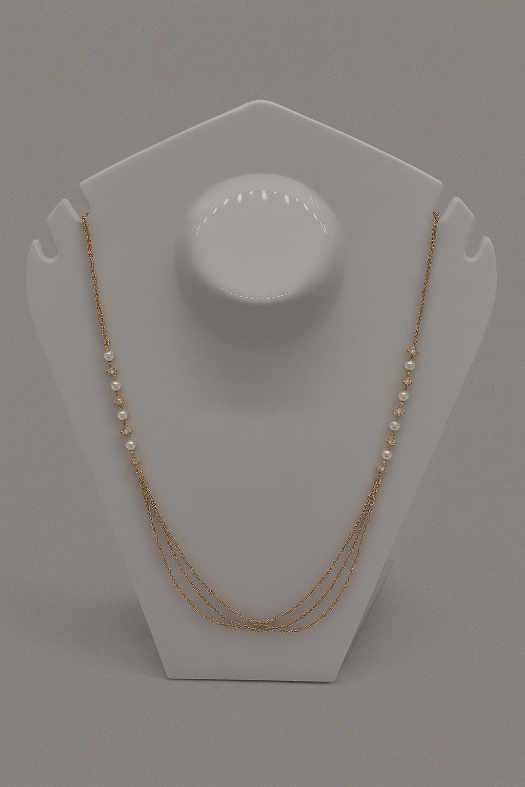 Elegant Gold Layered Pearl Necklace – Triple Chain Design with Dainty Pearl & Crystal Accents